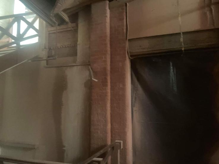 Paint and plaster removal from internal brick pillars